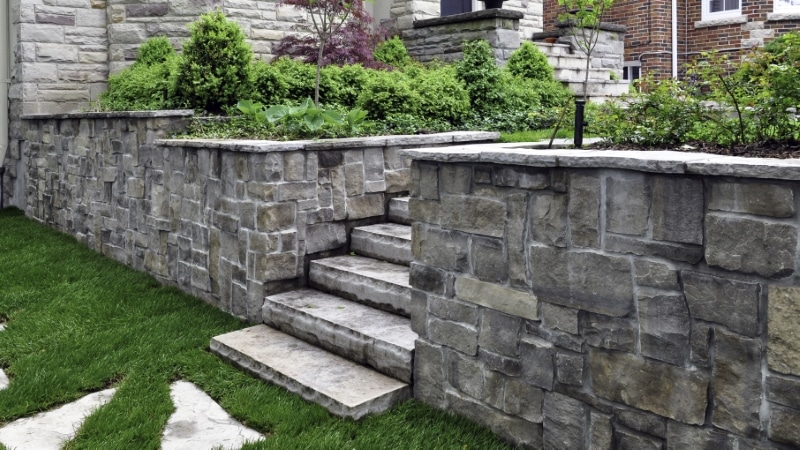 A custom-built natural stone pathway and steps at a client's home