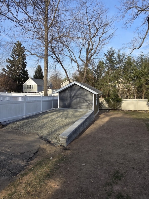 An In-Process Driveway and New Garage Build in Westwood, NJ by Loughlin And Son Construction from the Back Side
