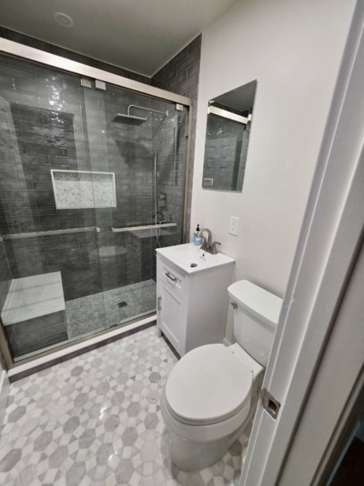Bathroom Renovation in Pearl River, NY by Loughlin & Son Construction in Grey Tones