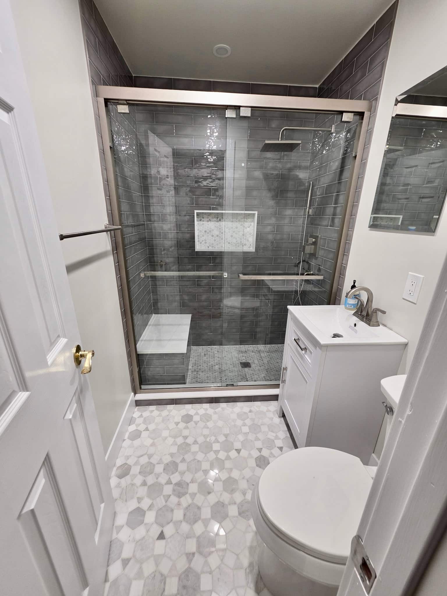 Bathroom Renovation in Pearl River, NY by Loughlin & Son Construction in Grey Tones