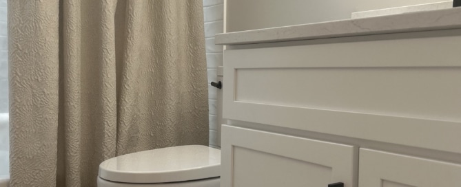 A renovated bathroom in New Jersey in neutral tones. Contractors - Loughlin & Son Construction