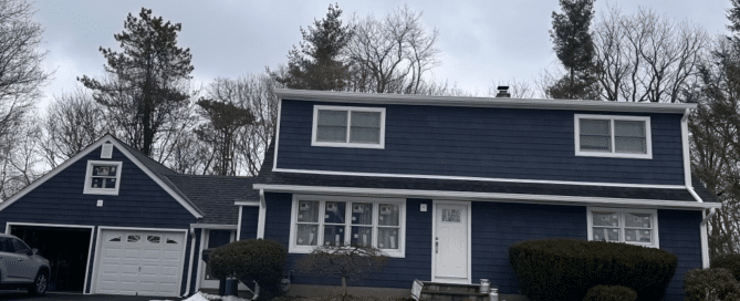 Blue House with New Siding in Rockland County Installed by Loughlin & Son Construction