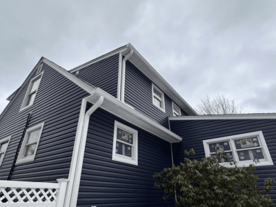 Home in Rockland County NY with New Blue Siding Installed by Loughlin & Son Construction