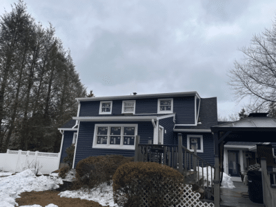 Home in Rockland County NY with New Blue Siding Installed by Loughlin & Son Construction